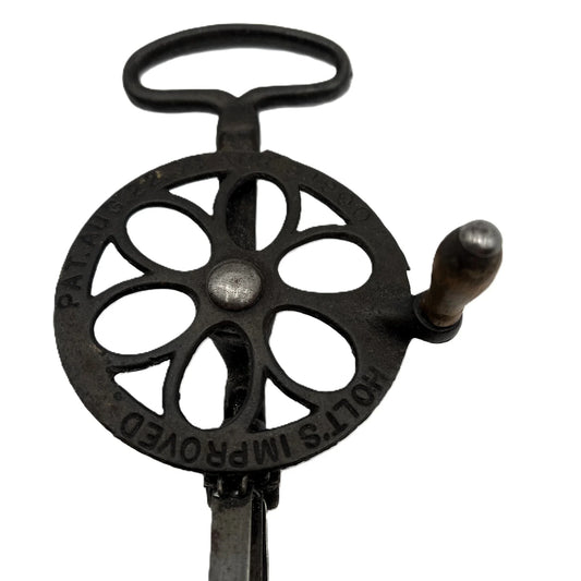 This is an Antique Holt's Egg Beater, made in the USA and patented in 1900. Impressed on the fly wheel with Holt's Improved, Pat. Aug. 22 1899. Apr 3 1900.