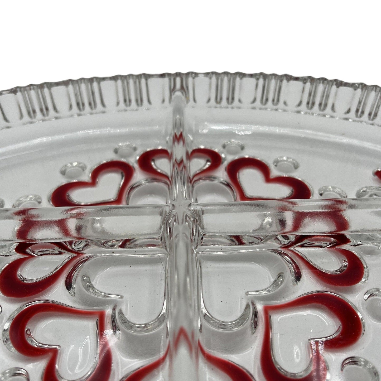 This is a vintage Walther Glas "Sweetheart" serving bowl, designed as a snack or sweets dish with a red heart and dot pattern. It is an oval, clear glass divided serving dish with a crimped edge.