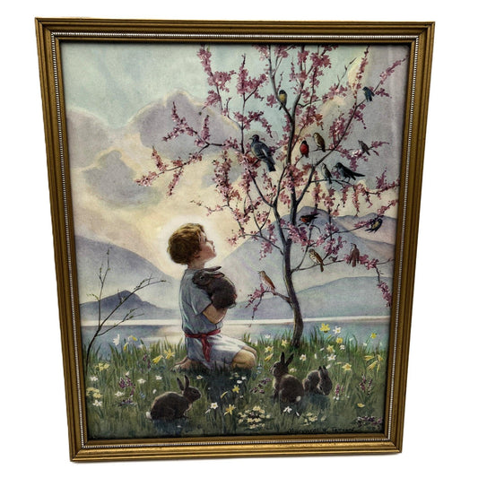 This is a framed print of the painting "Morning Carol" by the British illustrator Margaret Tarrant (1888-1959). The artwork depicts a child holding a rabbit, surrounded by other rabbits and birds under a blossoming tree, in a pastoral setting.