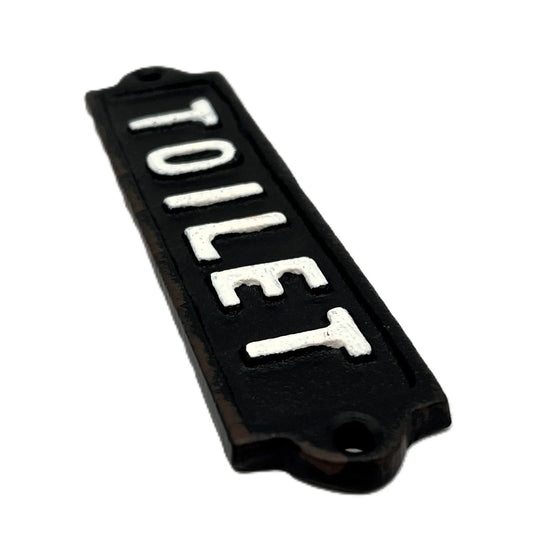 Add a touch of classic charm with this vintage-style cast iron “TOILET” sign. Hand-painted with a rustic finish, it’s the perfect accent for any bathroom door.