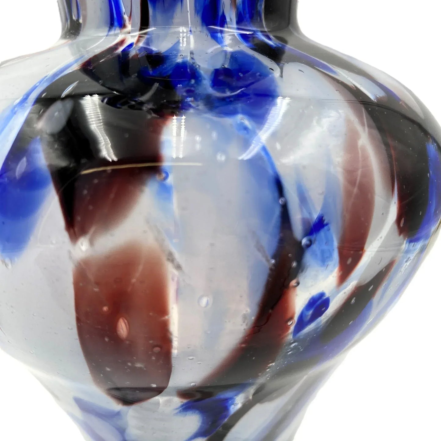 While this style is frequently attributed to Murano (Italy) due to its vibrant colours and handcrafted look, it is also highly characteristic of Bohemian/Czech art glass from the mid-20th century.
