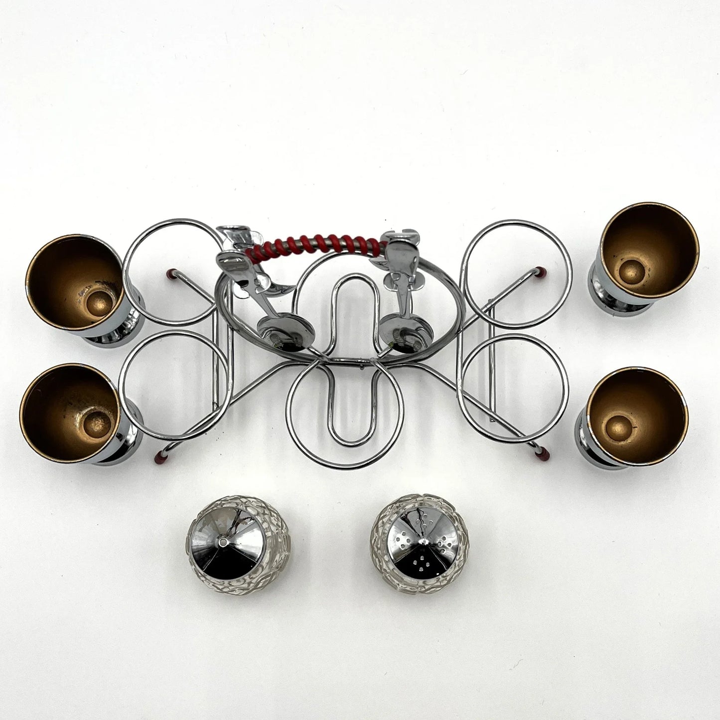 vintage 1960s egg cup holder with 4 egg cups, Salt and Pepper pots and 4 spoons. 
