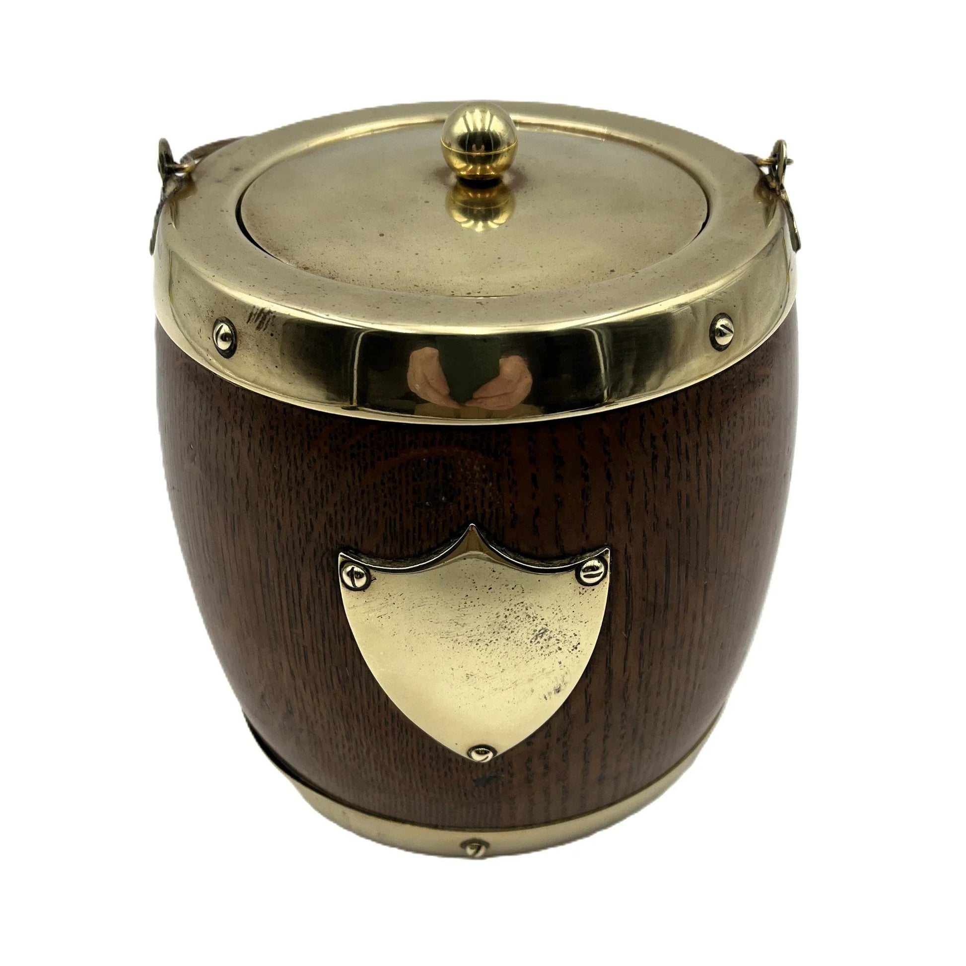 This is an Antique English Oak Biscuit Barrel, Tobacco Jar, or Ice Bucket with a porcelain liner, 