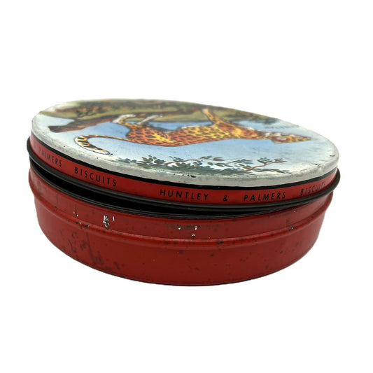 This is a smaller 1960s Huntley and Palmers biscuit tin, aimed at children with an image of, and the word Cheetah on the lid.