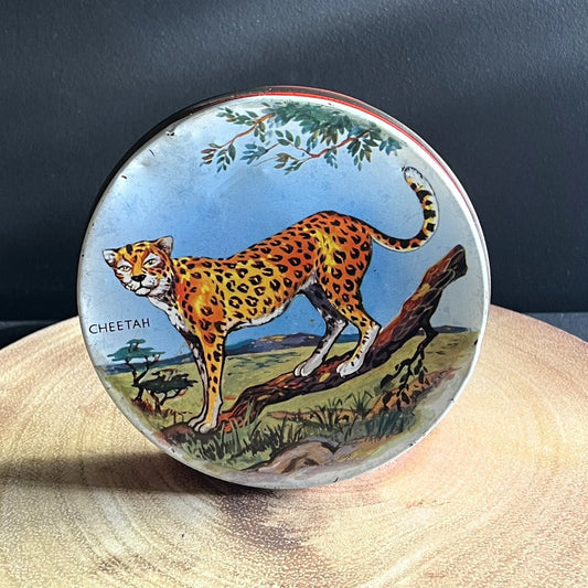 This is a smaller 1960s Huntley and Palmers biscuit tin, aimed at children with an image of, and the word Cheetah on the lid.