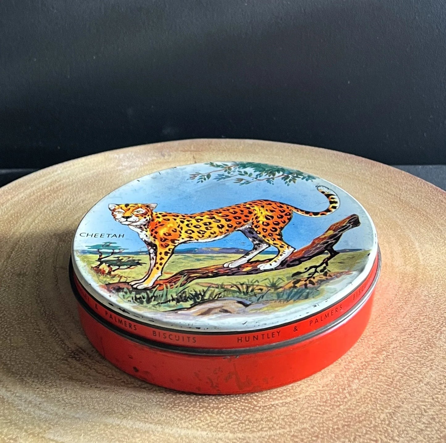 This is a smaller 1960s Huntley and Palmers biscuit tin, aimed at children with an image of, and the word Cheetah on the lid.