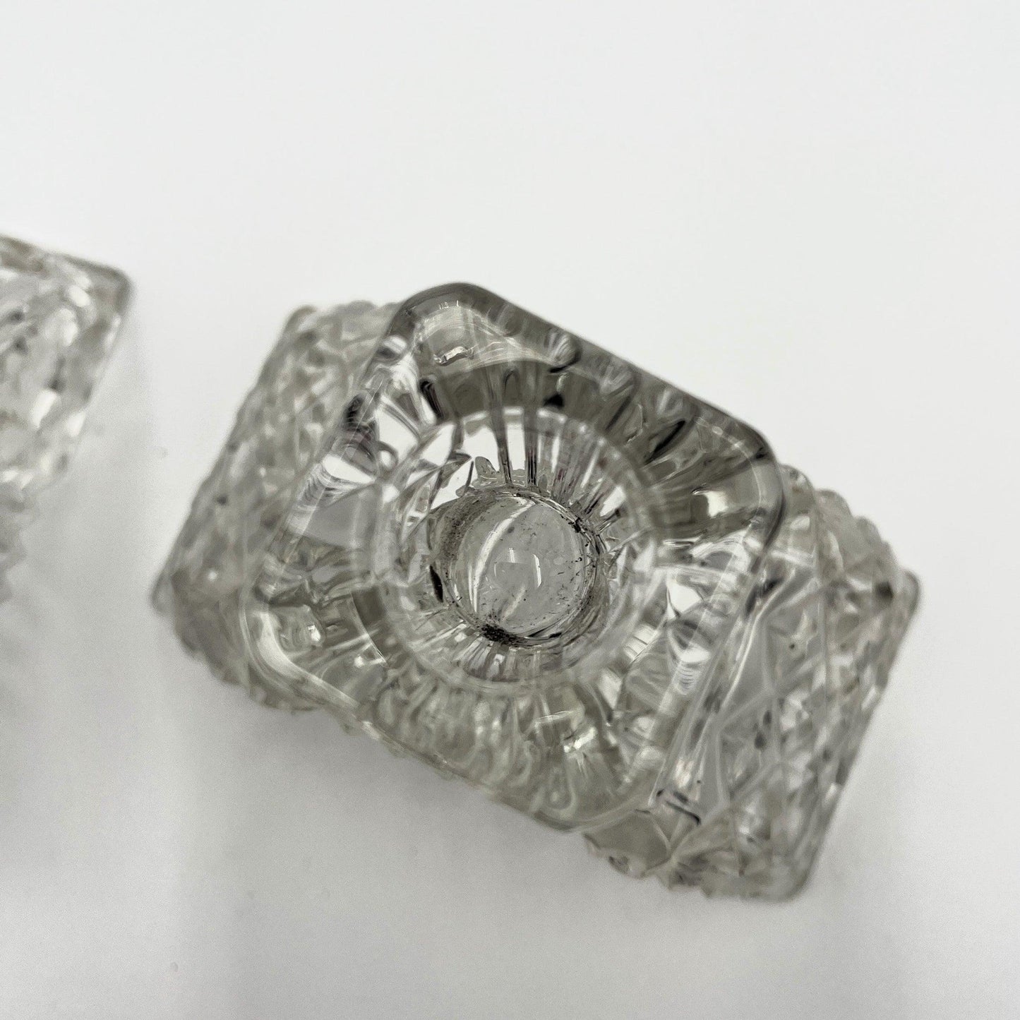 This is a Pair of Walther and Sohne 1930s-1940s Vintage Pressed Glass Candlesticks. 