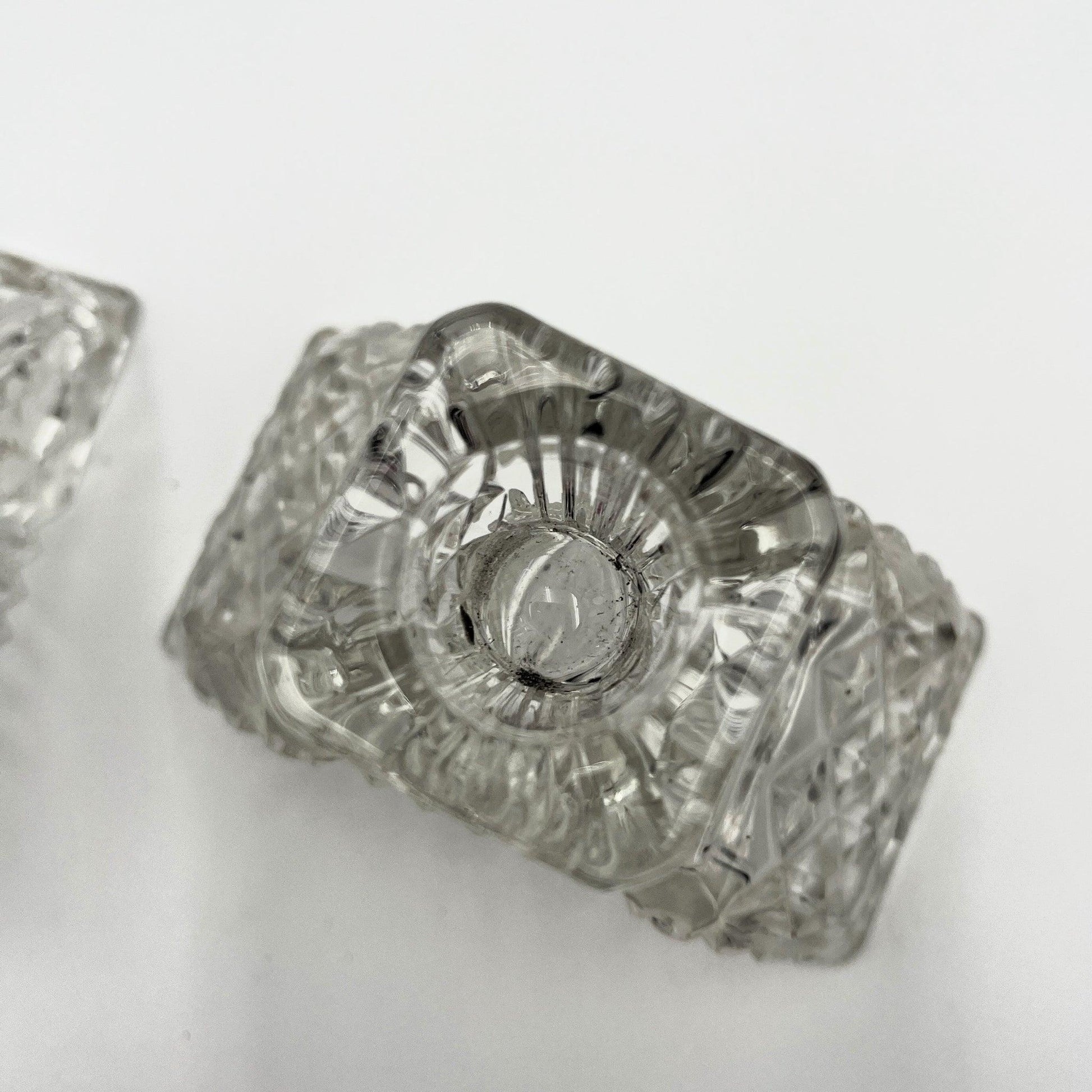 This is a Pair of Walther and Sohne 1930s-1940s Vintage Pressed Glass Candlesticks. 