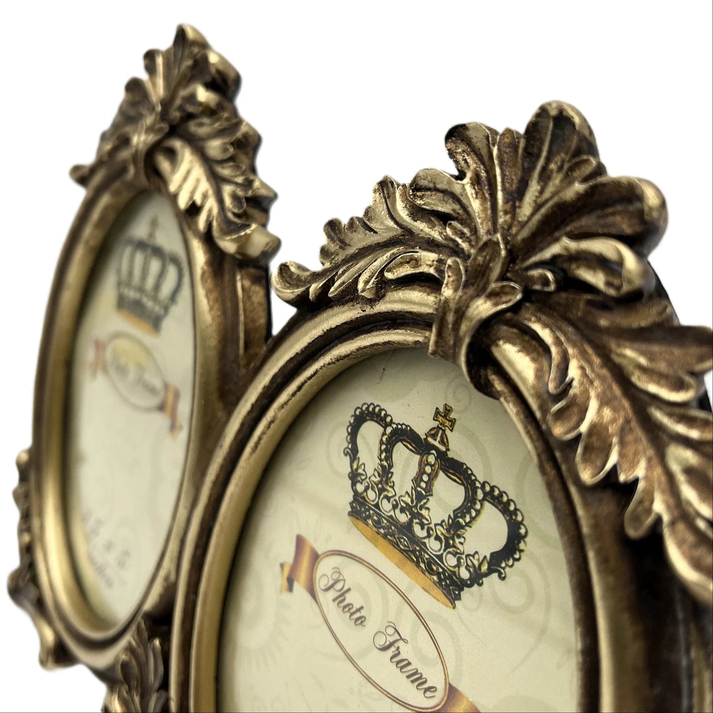 This is an elegant vintage-inspired double oval photo frame. Designed with ornate detailing and a distressed antique gold finish, this frame exudes timeless sophistication.