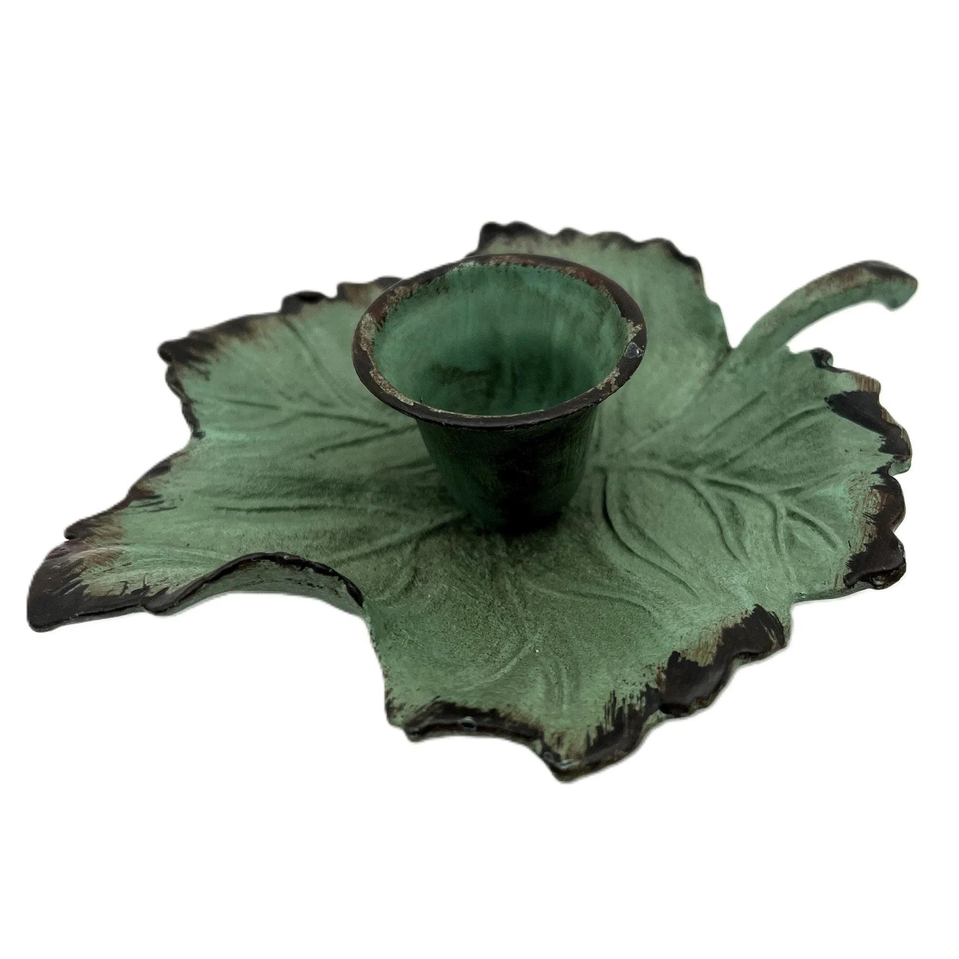 This is a Vintage-Inspired chamber stick candle holder. Made of metal this ivy leaf candle holder has a weathered, rustic, or distressed green patina finish with dark edges. 