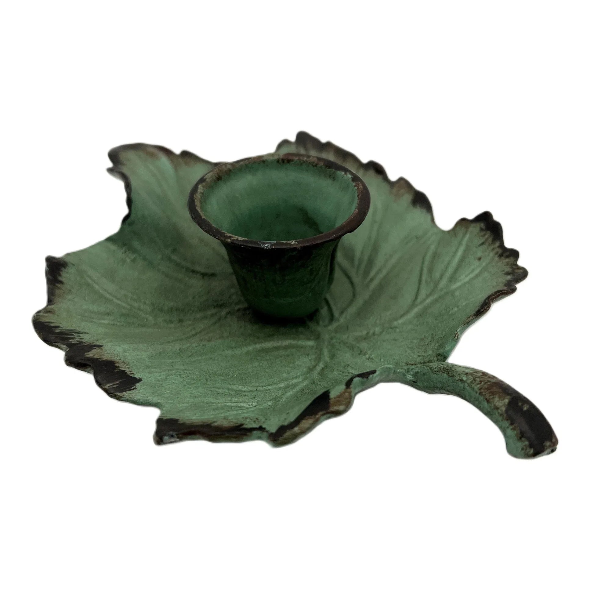This is a Vintage-Inspired chamber stick candle holder. Made of metal this ivy leaf candle holder has a weathered, rustic, or distressed green patina finish with dark edges. 