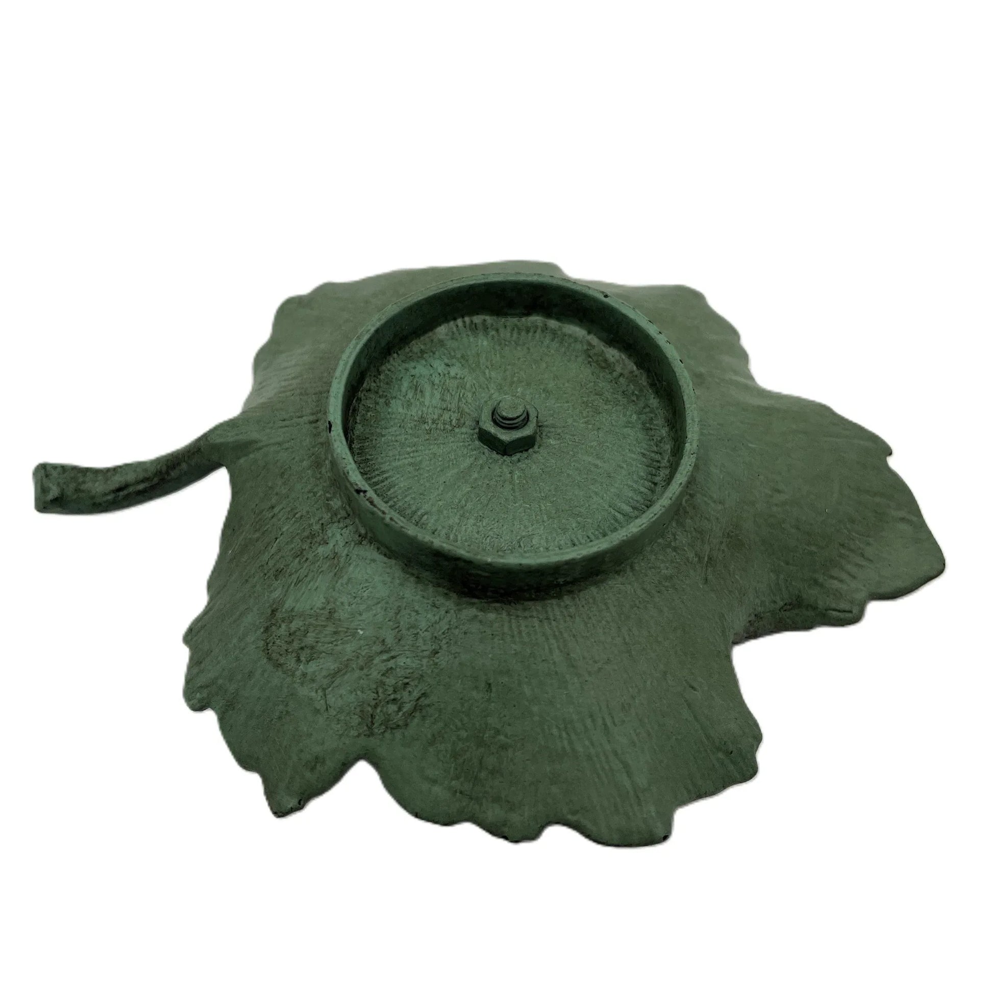 This is a Vintage-Inspired chamber stick candle holder. Made of metal this ivy leaf candle holder has a weathered, rustic, or distressed green patina finish with dark edges. 