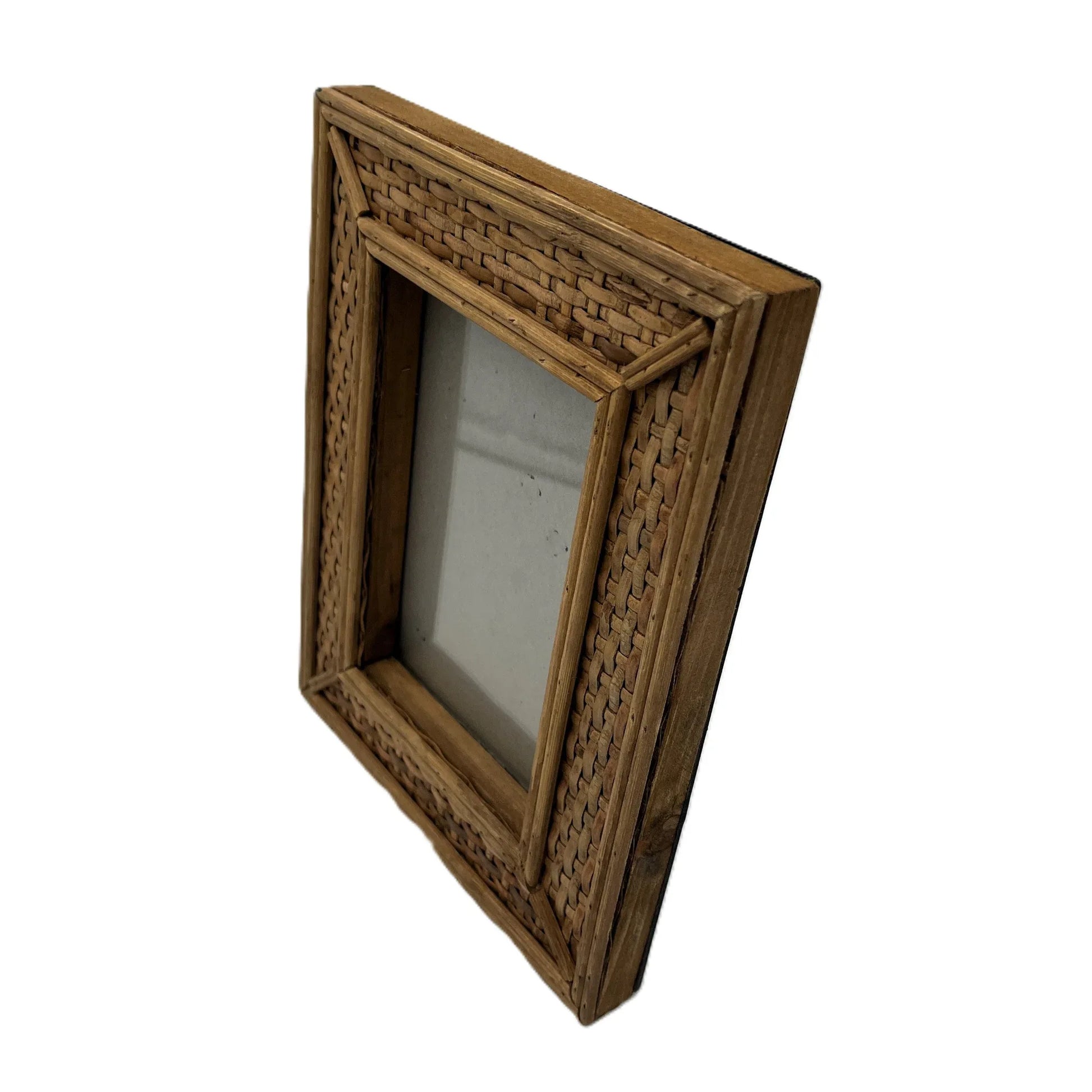 This frame, crafted from rattan, adds a touch of traditional country house charm to any home