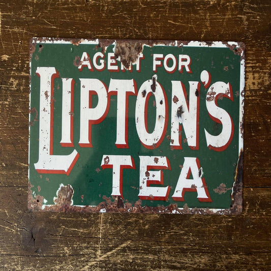 Vintage-Style Lipton's Tea sign on a wooden surface, from Vintage Whippet