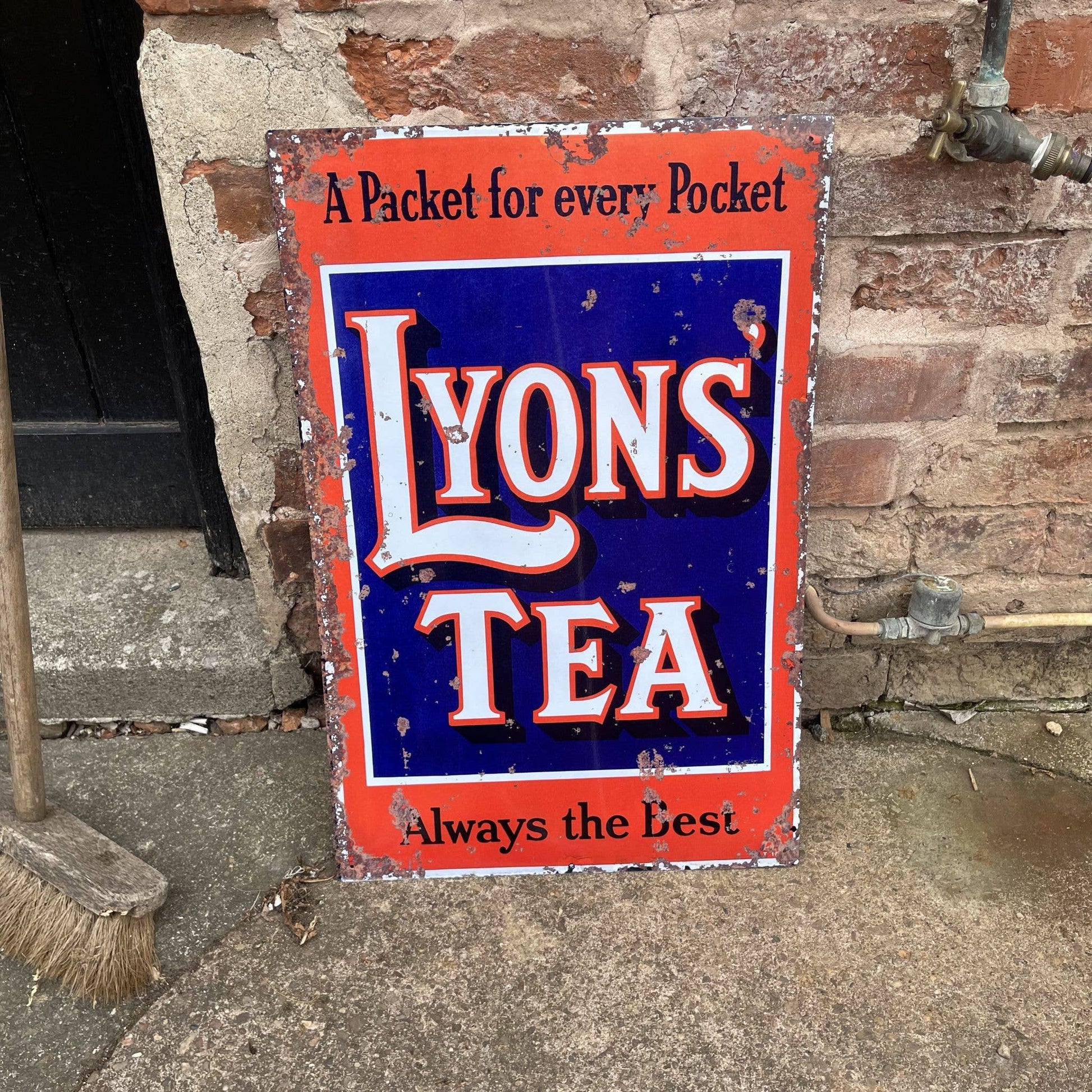 Vintage-Style Lyons Tea sign against a brick wall, from Vintage Whippet