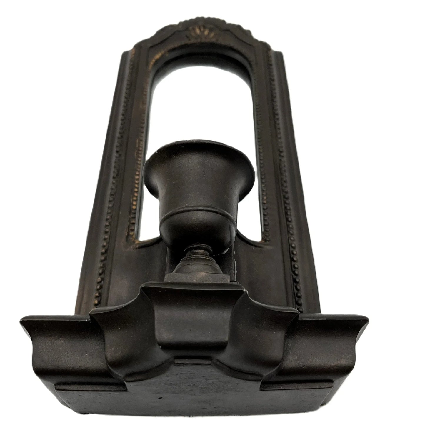 This is a used heavy, vintage-style mirrored wall candle sconce in a bronze-like finish. It has lovely detailing with worn gold accents. It has a felt back with a ring for hanging.