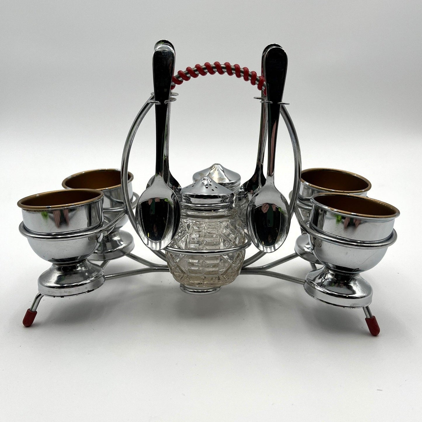 vintage 1960s egg cup holder with 4 egg cups, Salt and Pepper pots and 4 spoons