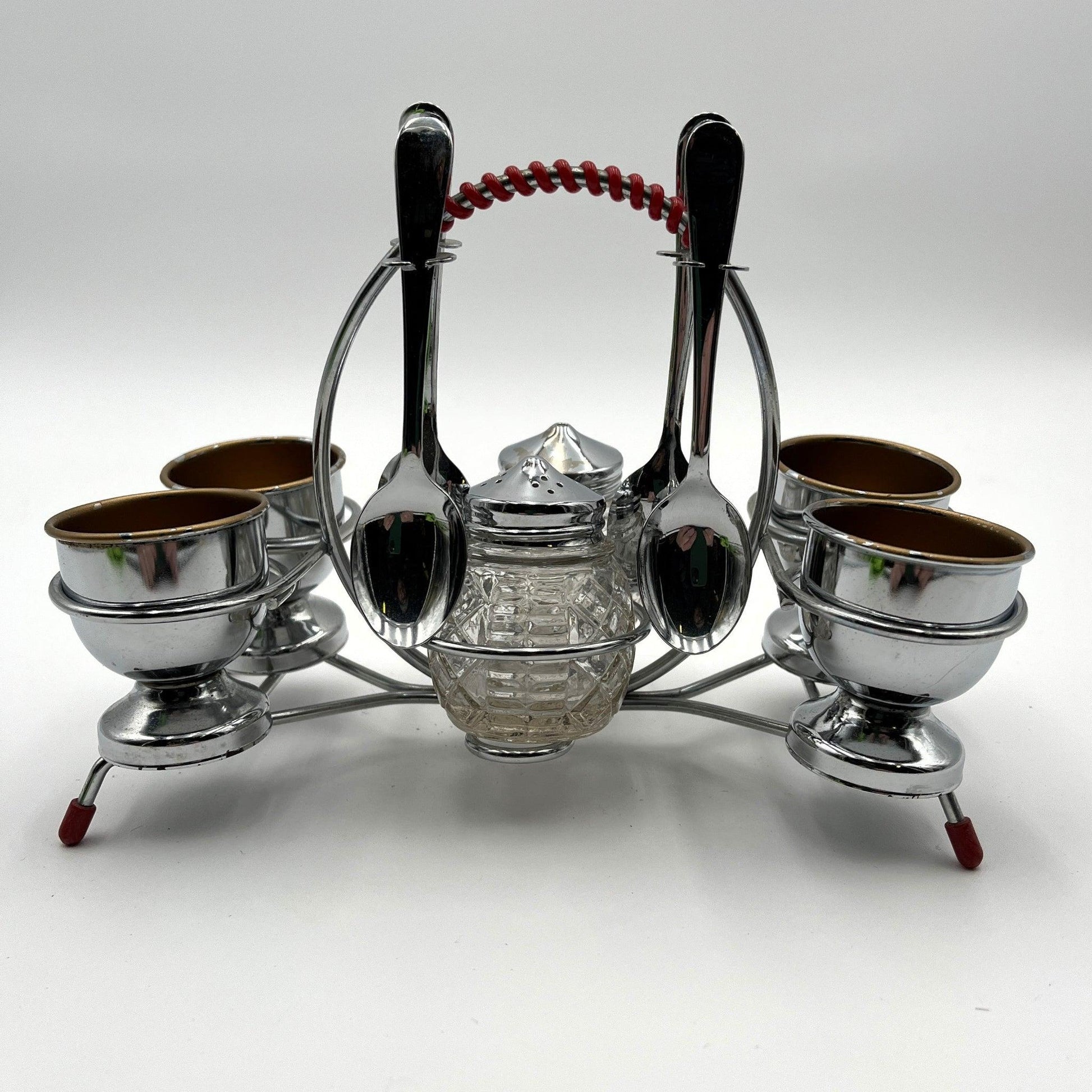vintage 1960s egg cup holder with 4 egg cups, Salt and Pepper pots and 4 spoons