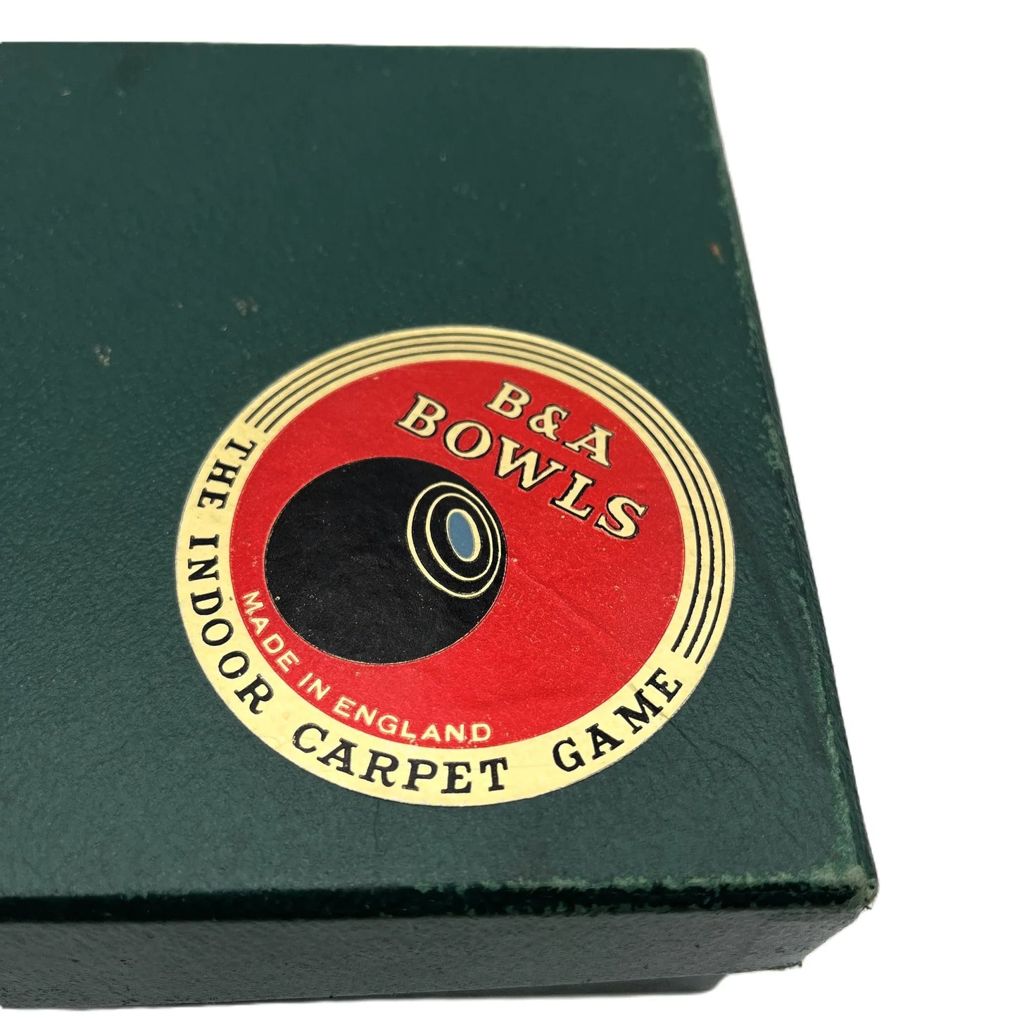 This is a vintage B&A Home Carpet Bowls set, a miniaturized version of lawn bowls designed for indoor play. 
Manufactured by the British company Banda, these sets are often considered collectibles. 
