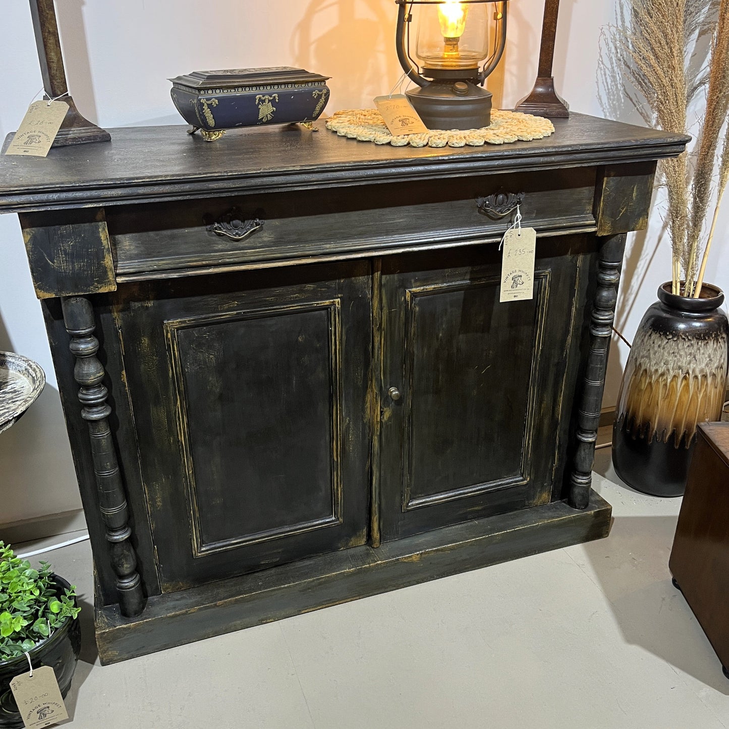 This is an old vintage painted sideboard. It has been cleaned inside and out, properly prepared, and the exterior painted with a paint finish to give an aged patina effect.