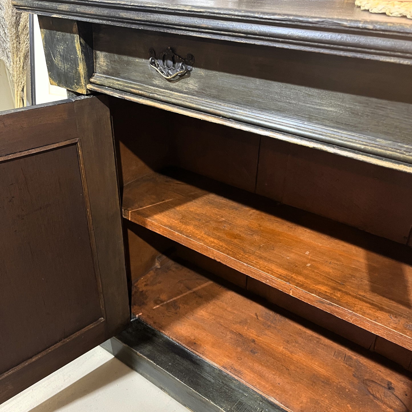 This is an old vintage painted sideboard. It has been cleaned inside and out, properly prepared, and the exterior painted with a paint finish to give an aged patina effect.
