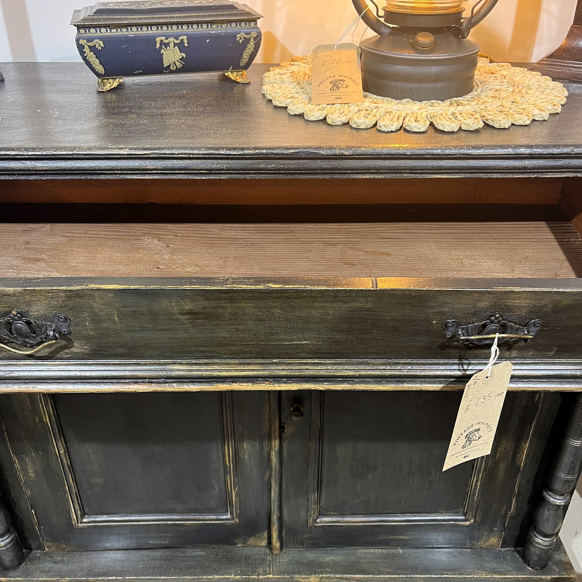 This is an old vintage painted sideboard. It has been cleaned inside and out, properly prepared, and the exterior painted with a paint finish to give an aged patina effect.