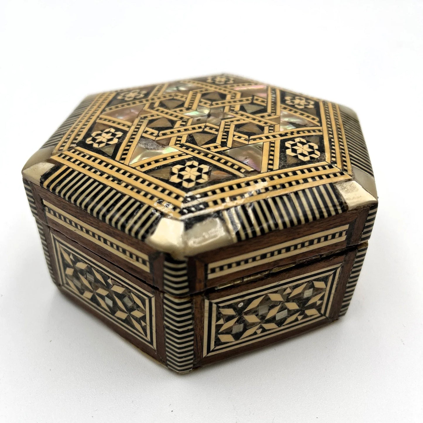 vintage hexagonal mosaic box, traditionally crafted in the Middle East with artisan techniques. 