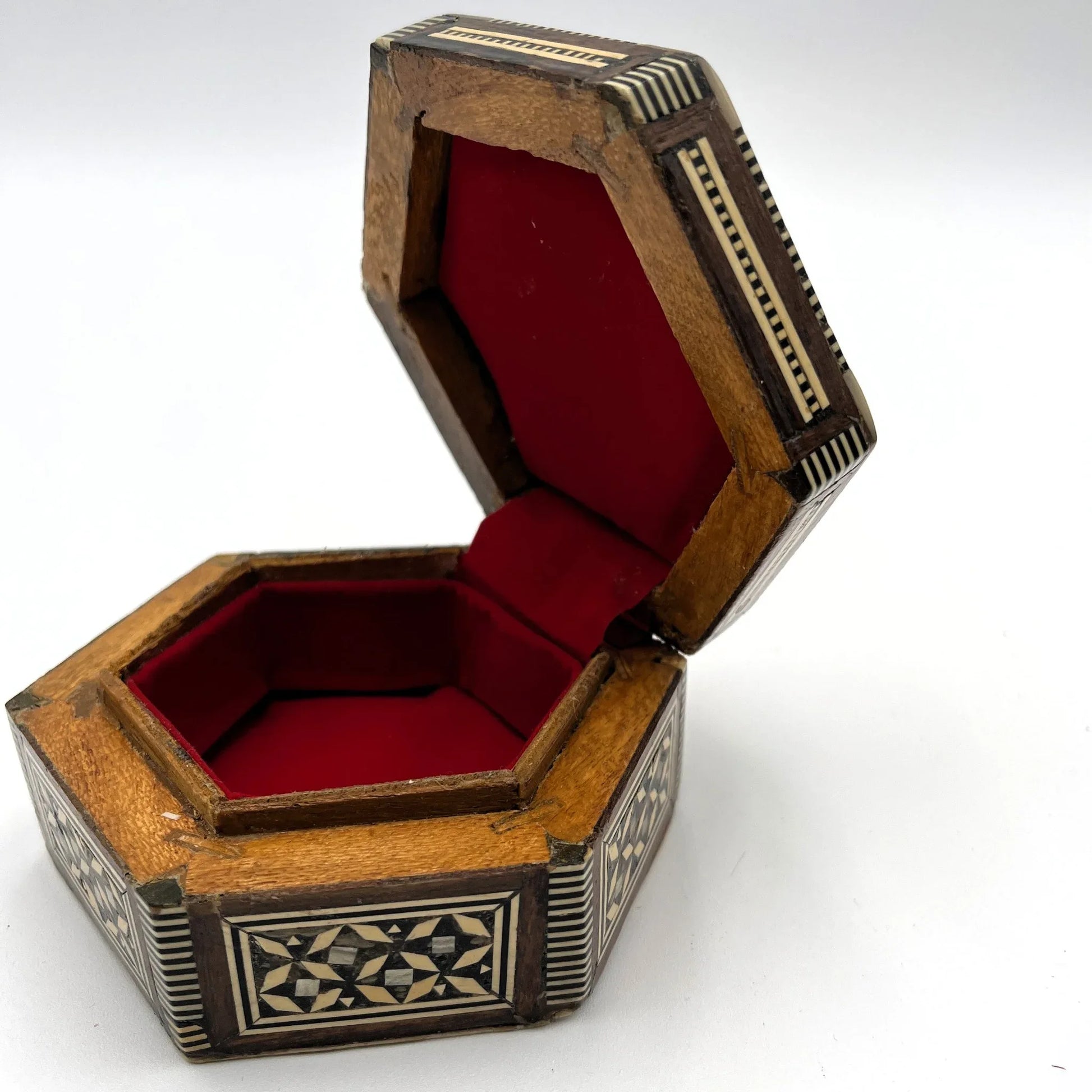 vintage hexagonal mosaic box, traditionally crafted in the Middle East with artisan techniques. 
