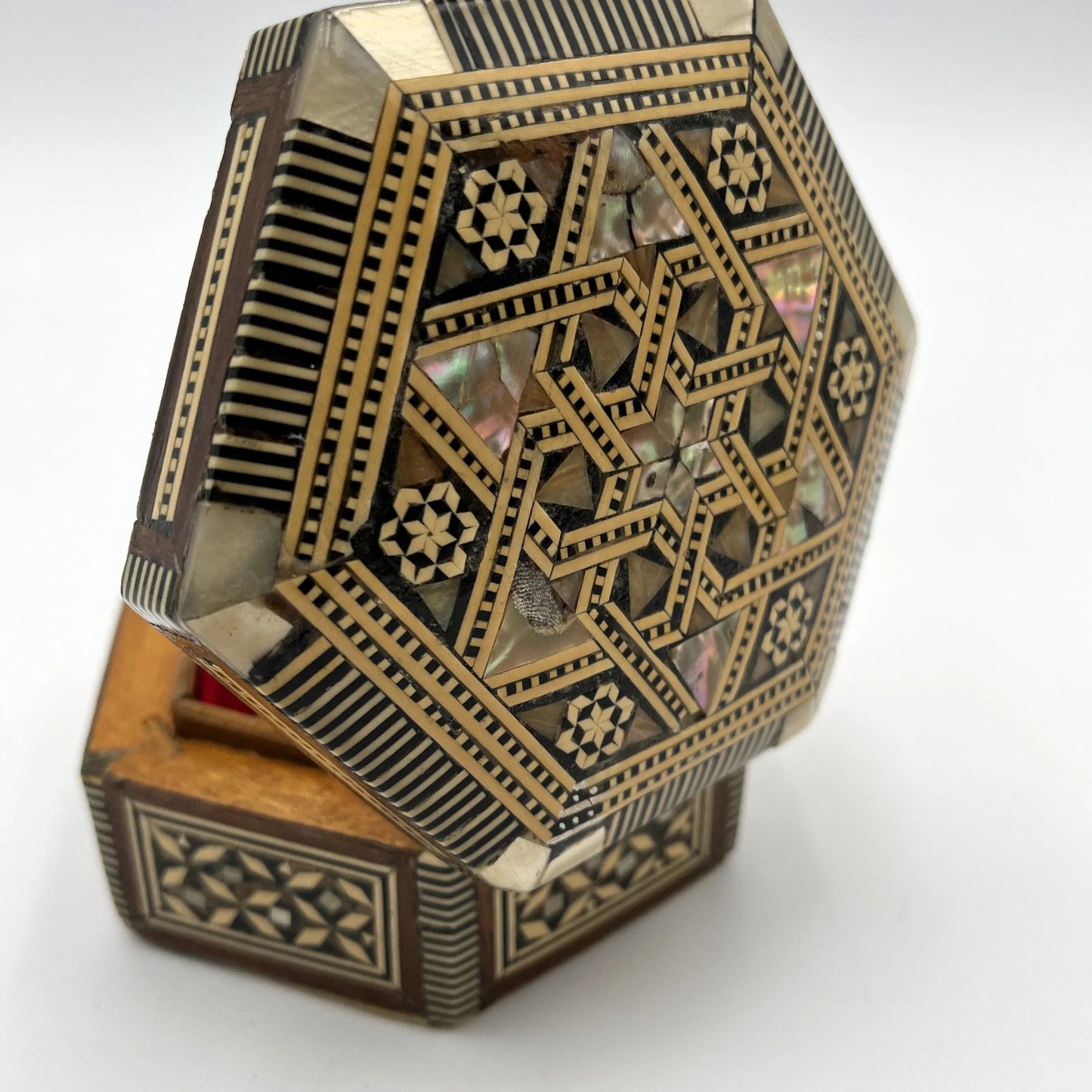 vintage hexagonal mosaic box, traditionally crafted in the Middle East with artisan techniques. 