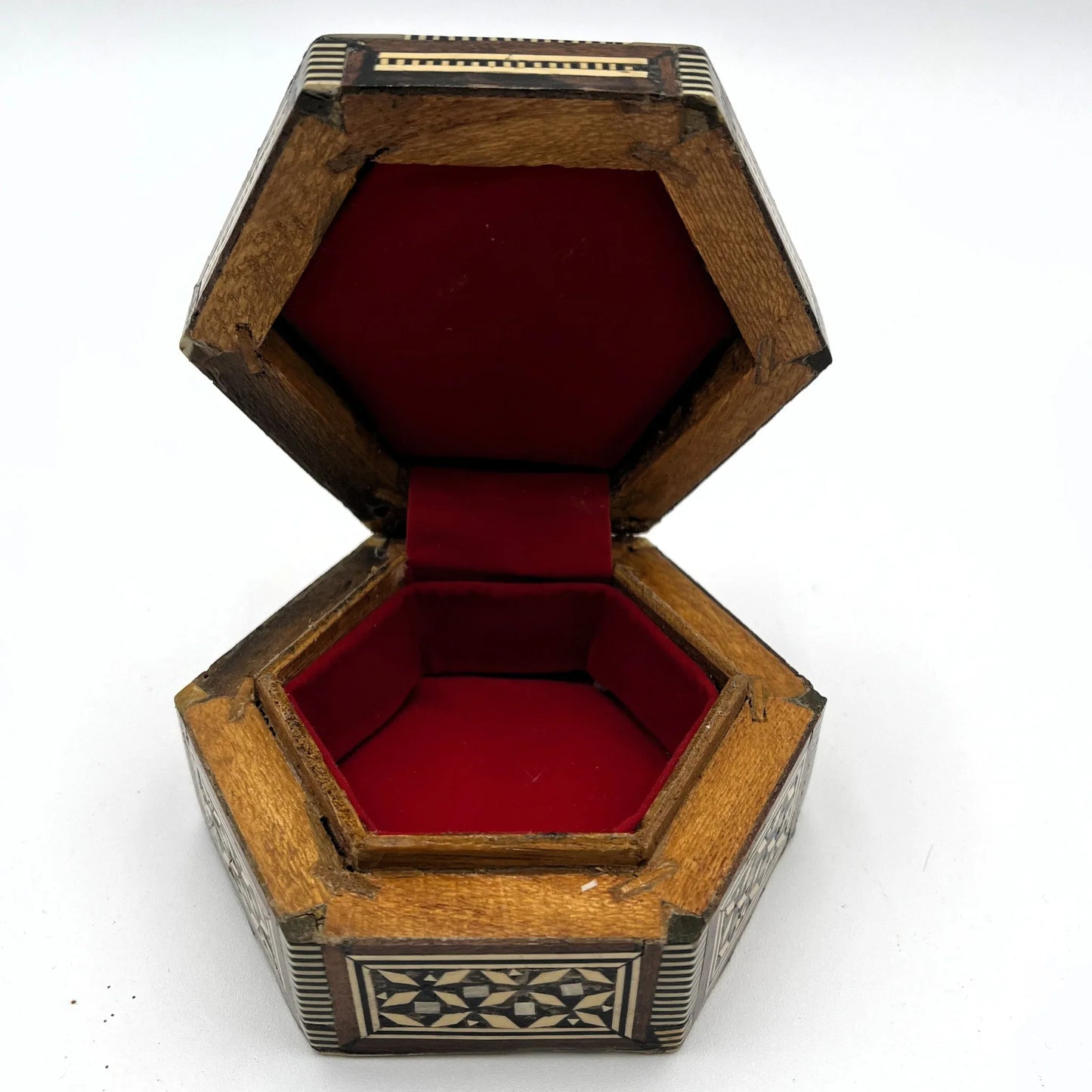 vintage hexagonal mosaic box, traditionally crafted in the Middle East with artisan techniques. 