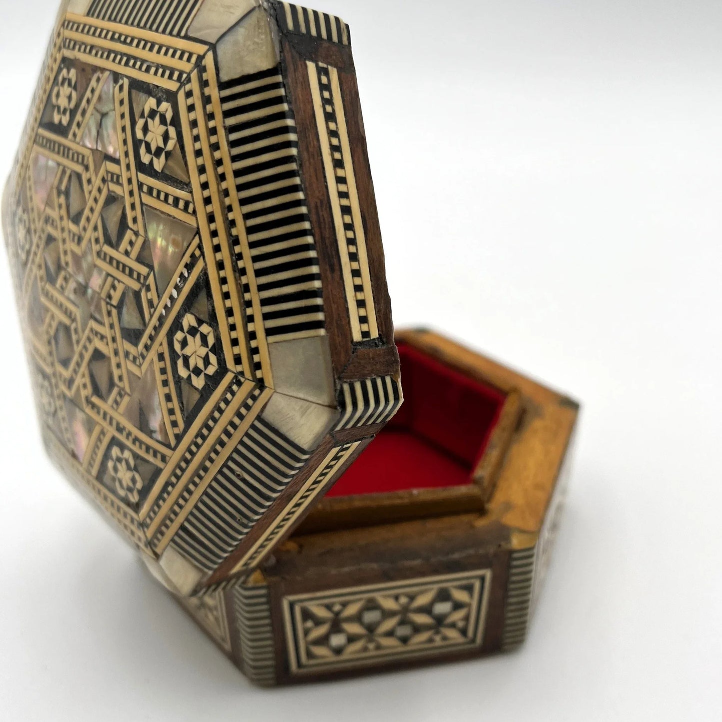 vintage hexagonal mosaic box, traditionally crafted in the Middle East with artisan techniques. 
