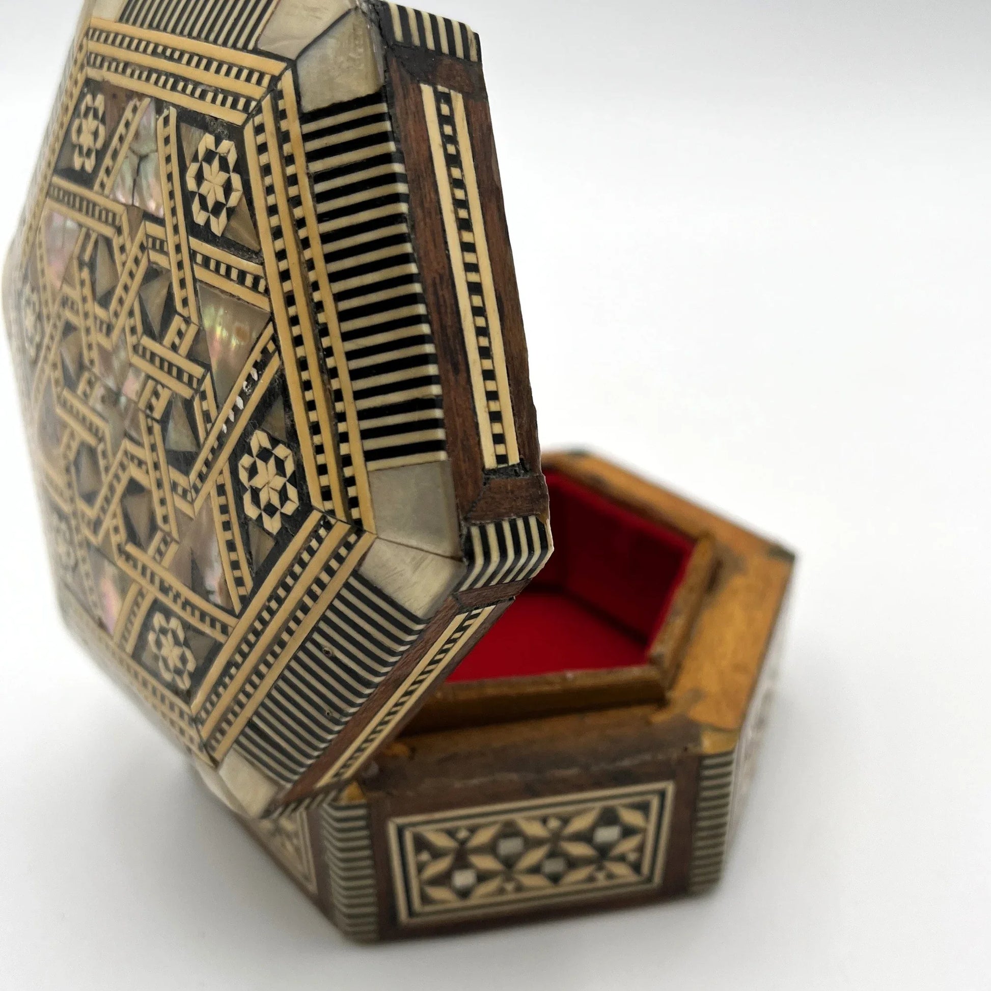 vintage hexagonal mosaic box, traditionally crafted in the Middle East with artisan techniques. 