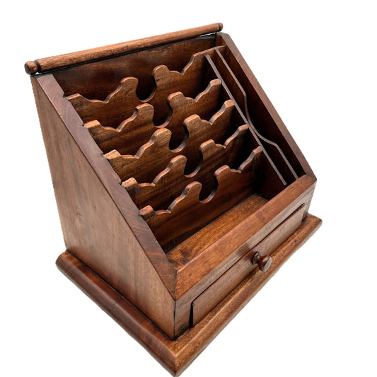 This is a vintage Mahogany Letter Rack Writing Desk Tidy. Raised on small feet, it has eight compartments and a drawer to the front. 