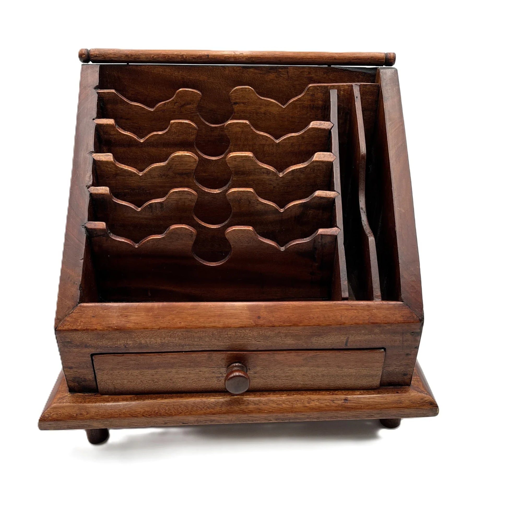 This is a vintage Mahogany Letter Rack Writing Desk Tidy. Raised on small feet, it has eight compartments and a drawer to the front. 