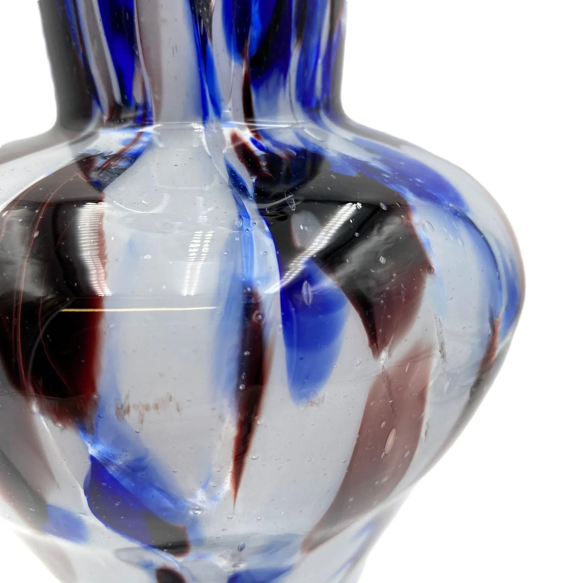 While this style is frequently attributed to Murano (Italy) due to its vibrant colours and handcrafted look, it is also highly characteristic of Bohemian/Czech art glass from the mid-20th century.