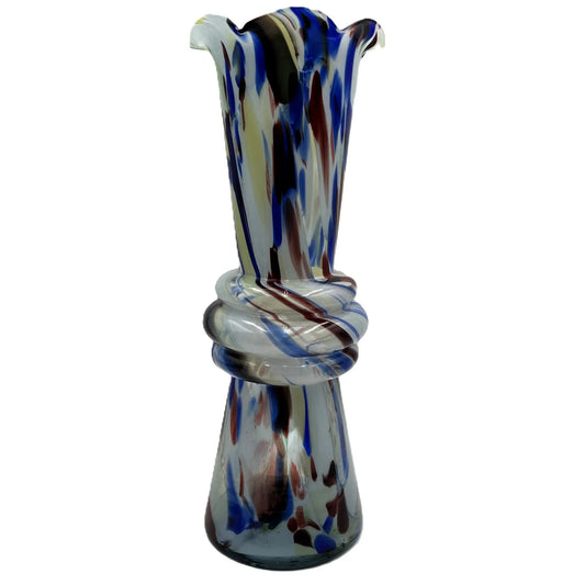 This mid-century Spatter or End of Day Vase.  It features a colorful "end of the day" or splatter design with blue, red, white, and black colours under clear glass. 