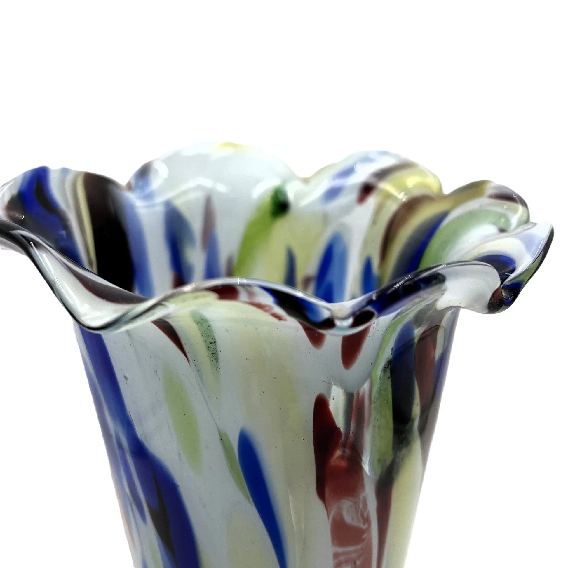 This mid-century Spatter or End of Day Vase.  It features a colorful "end of the day" or splatter design with blue, red, white, and black colours under clear glass.