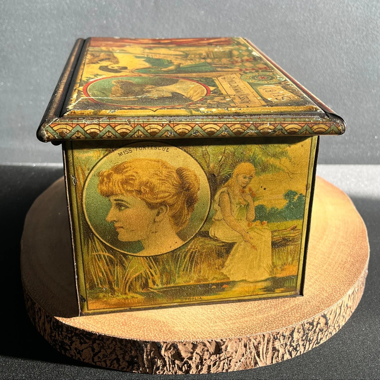 This is a Vintage early 1900s, Moss Rimmington and Co Mustart Tin, Selby Works, West Riding Mills. On the sides of the tin, there are lithographic images of plays and their characters.