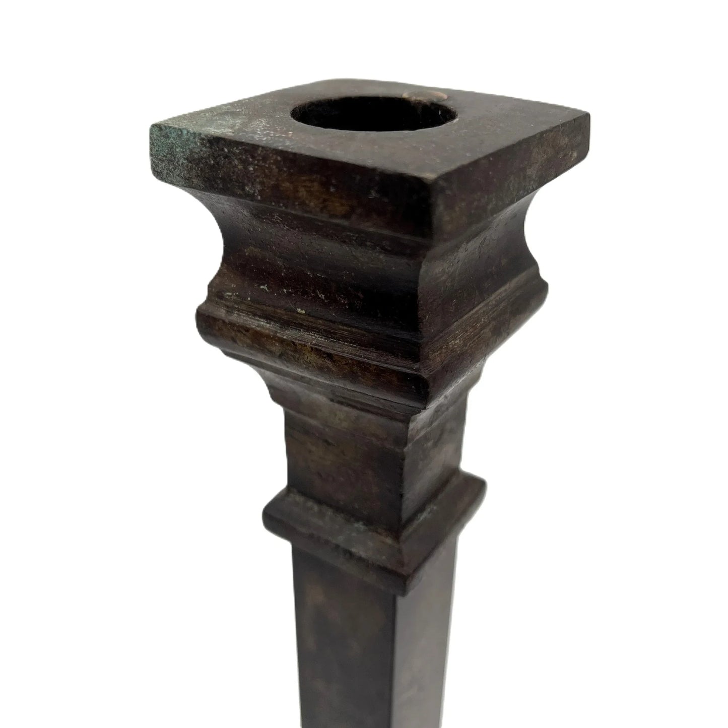 These are a heavy pair of cast metal candlesticks with a bronze or bronze coloured metal patina look. 