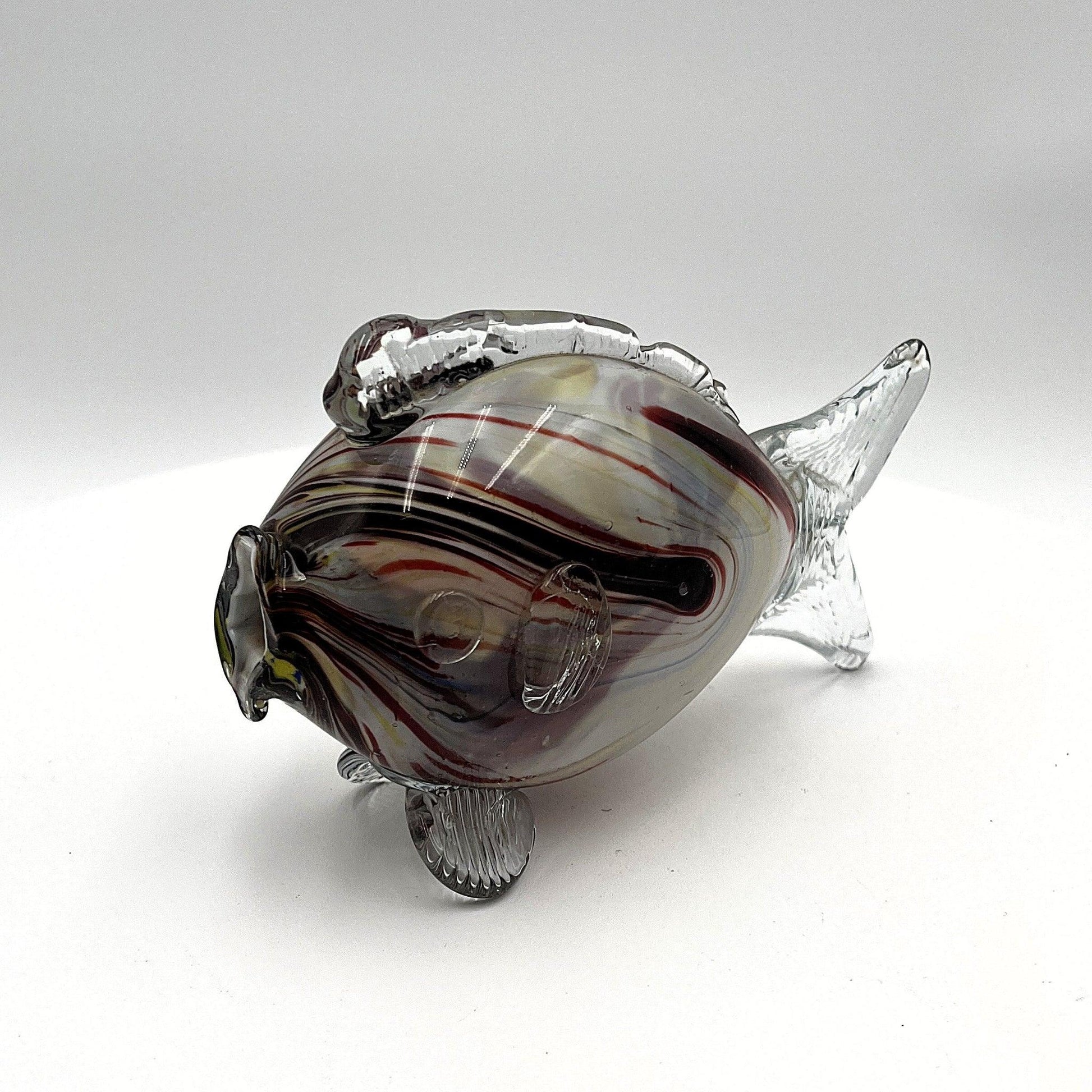 This is a pair of mid-century Spatter, End of Day, or marbled fish.  They feature a colourful marbled design with clear glass fins.