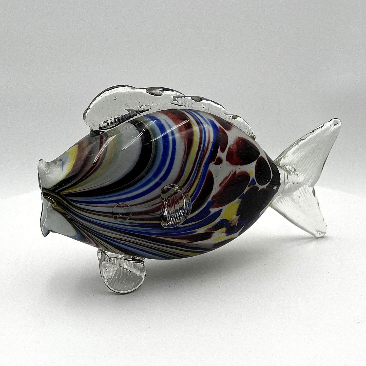 This is a pair of mid-century Spatter, End of Day, or marbled fish.  They feature a colourful marbled design with clear glass fins.