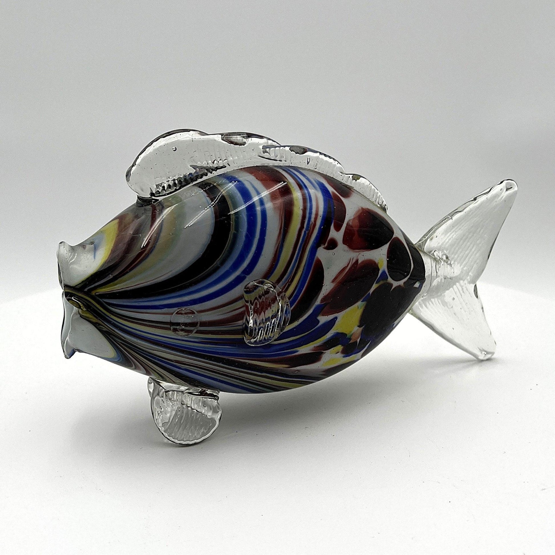 This is a pair of mid-century Spatter, End of Day, or marbled fish.  They feature a colourful marbled design with clear glass fins.