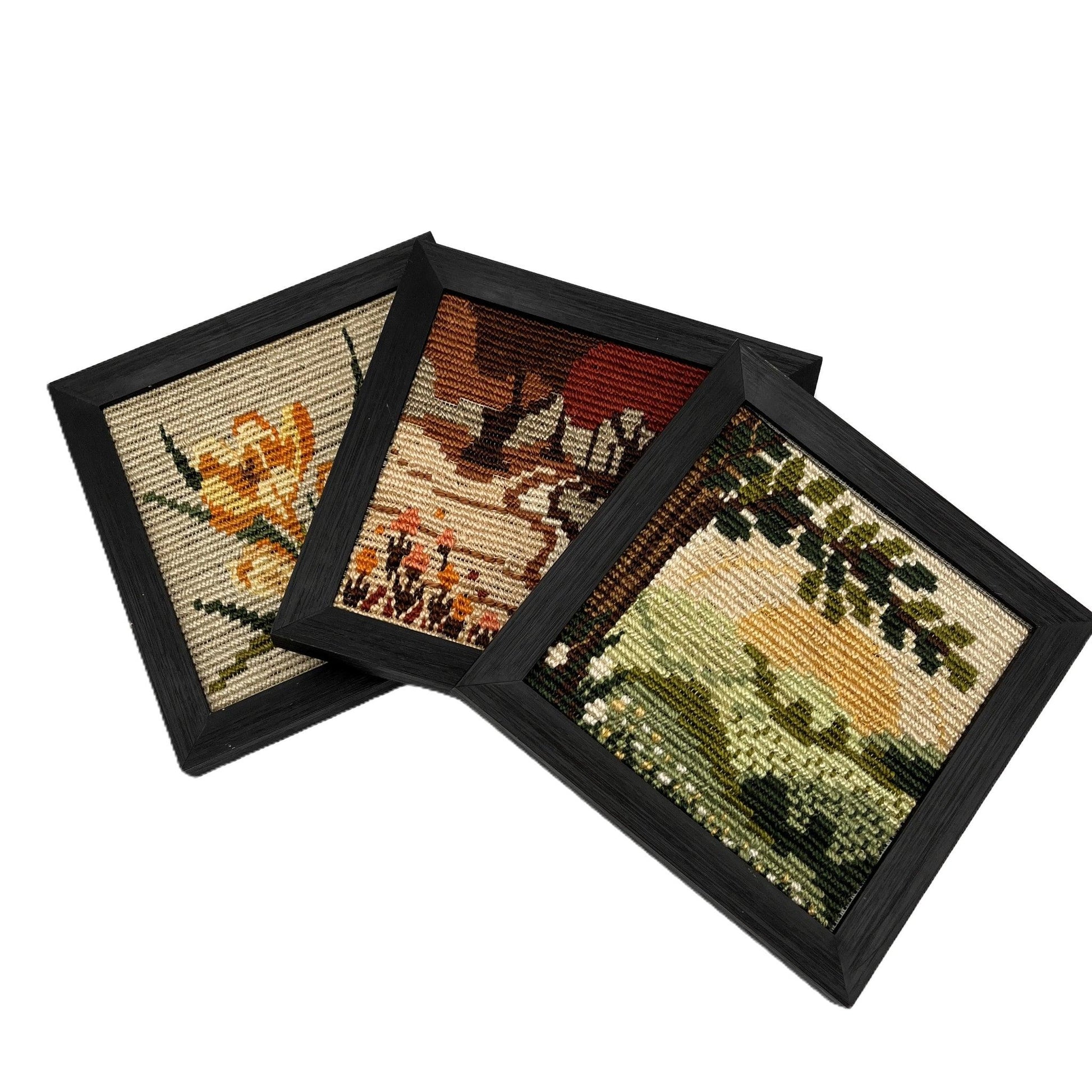 This is a vintage set of 3 framed needlepoint pictures from the 1970s or 1980s. Housed in a black frame, from a German Picto Stitch Kit depicting 3 scenes.