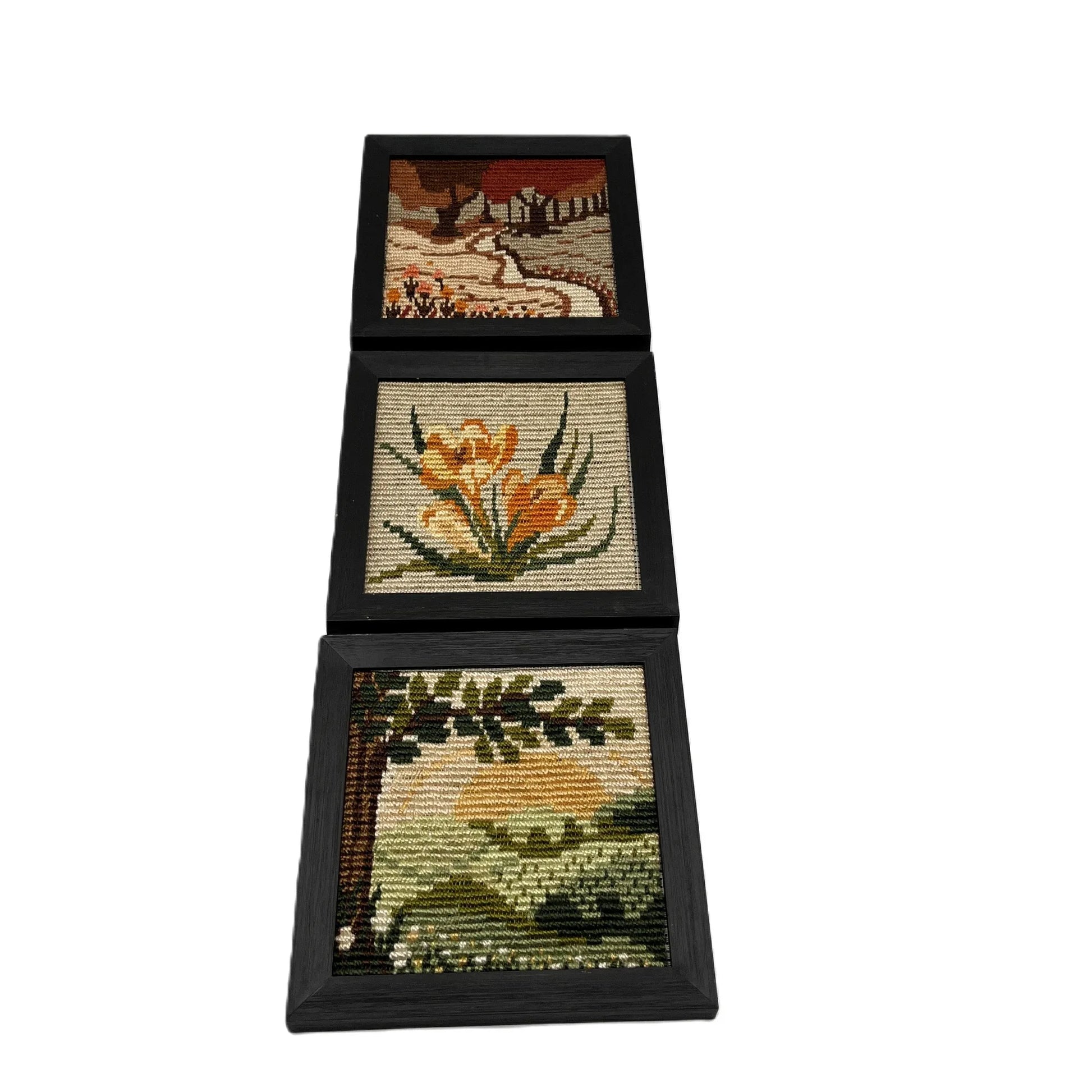 This is a vintage set of 3 framed needlepoint pictures from the 1970s or 1980s. Housed in a black frame, from a German Picto Stitch Kit depicting 3 scenes.