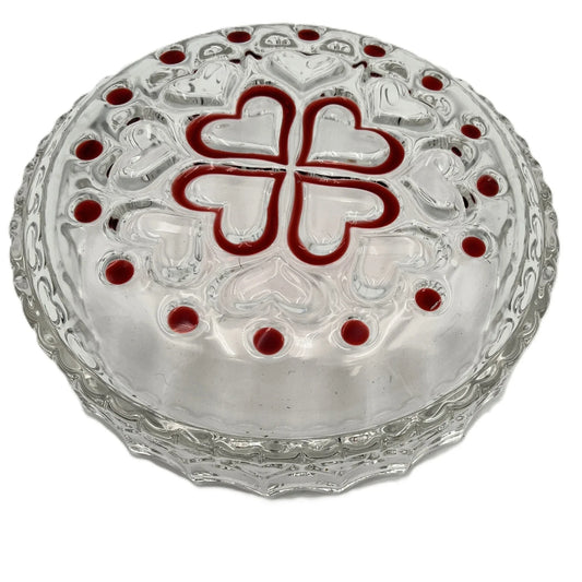 This is a vintage Walther Glas "Sweetheart" design serving bowl with a red heart and dot pattern. It is a round, clear glass bowl with a crimped edge and heart pattern design.