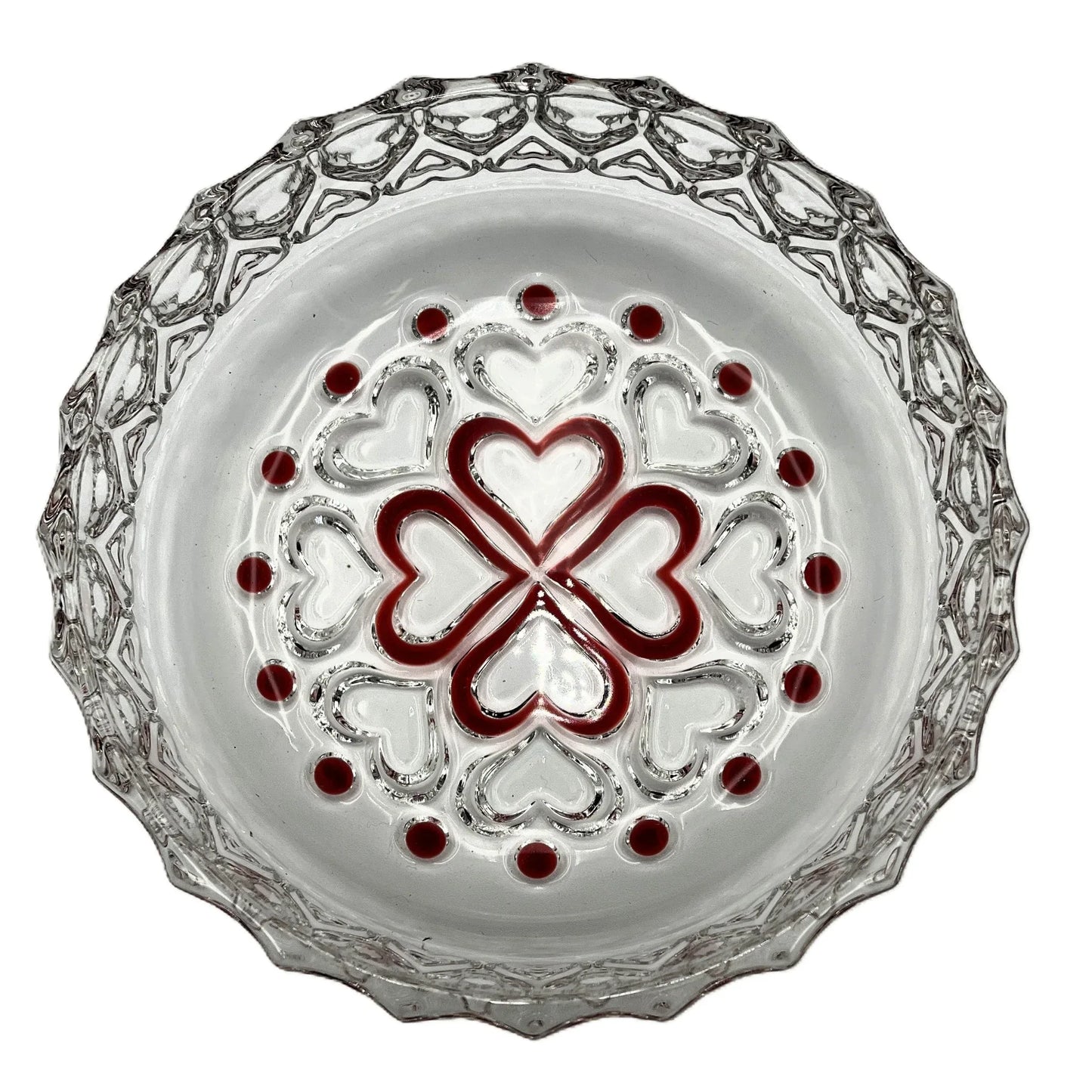 This is a vintage Walther Glas "Sweetheart" design serving bowl with a red heart and dot pattern. It is a round, clear glass bowl with a crimped edge and heart pattern design.