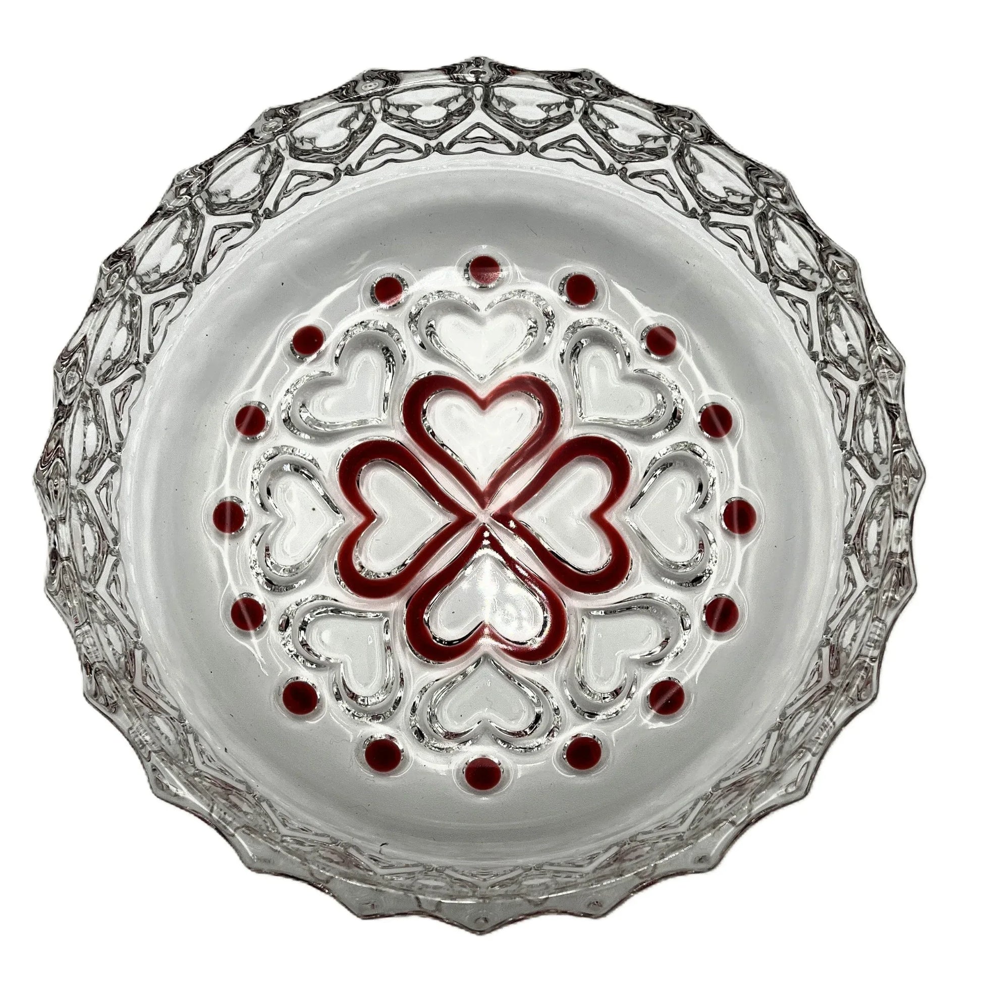 This is a vintage Walther Glas "Sweetheart" design serving bowl with a red heart and dot pattern. It is a round, clear glass bowl with a crimped edge and heart pattern design.