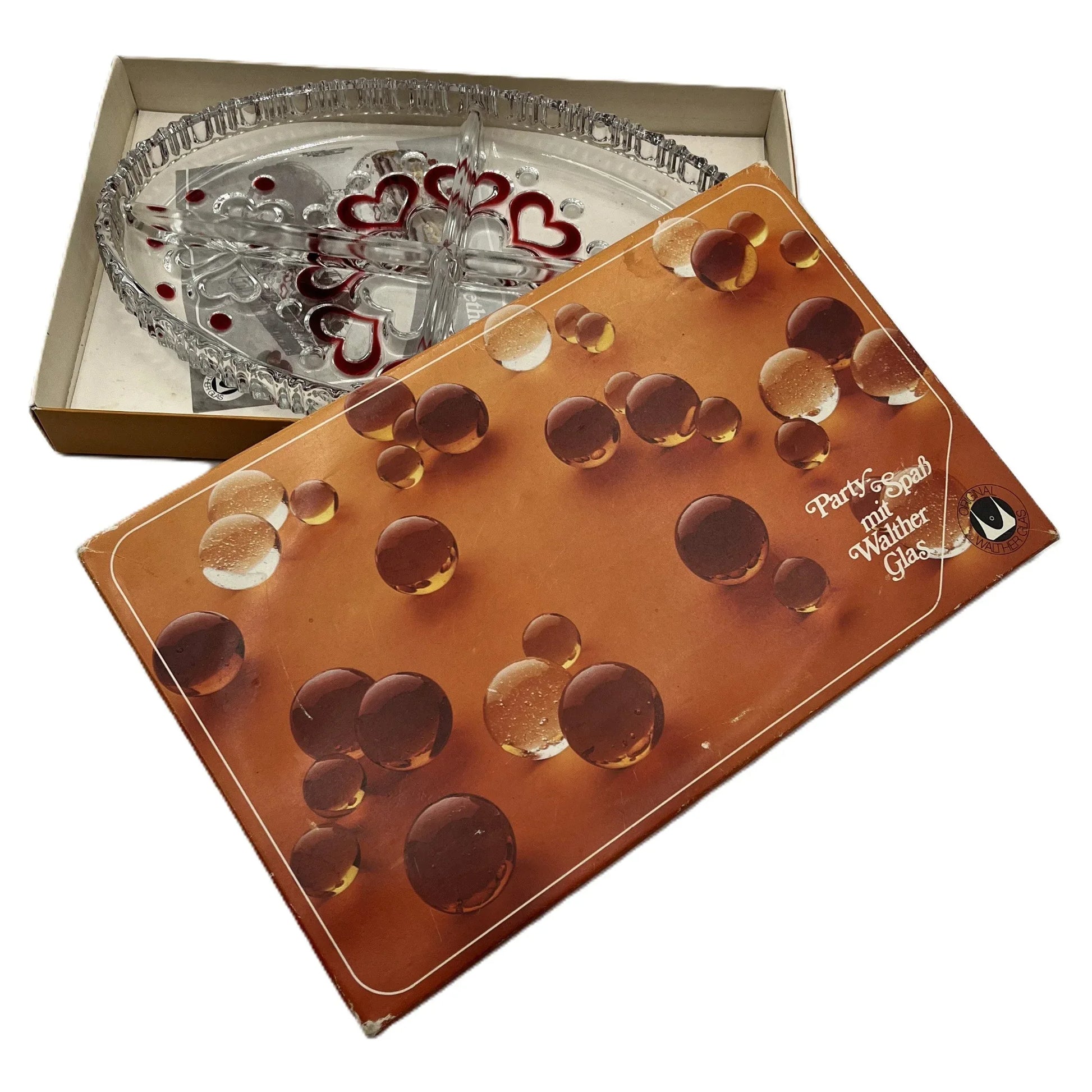 This is a vintage Walther Glas "Sweetheart" serving bowl, designed as a snack or sweets dish with a red heart and dot pattern. It is an oval, clear glass divided serving dish with a crimped edge.