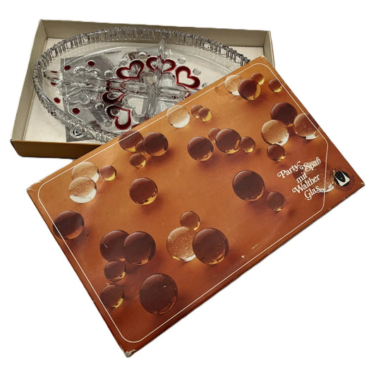 This is a vintage Walther Glas "Sweetheart" serving bowl, designed as a snack or sweets dish with a red heart and dot pattern. It is an oval, clear glass divided serving dish with a crimped edge.