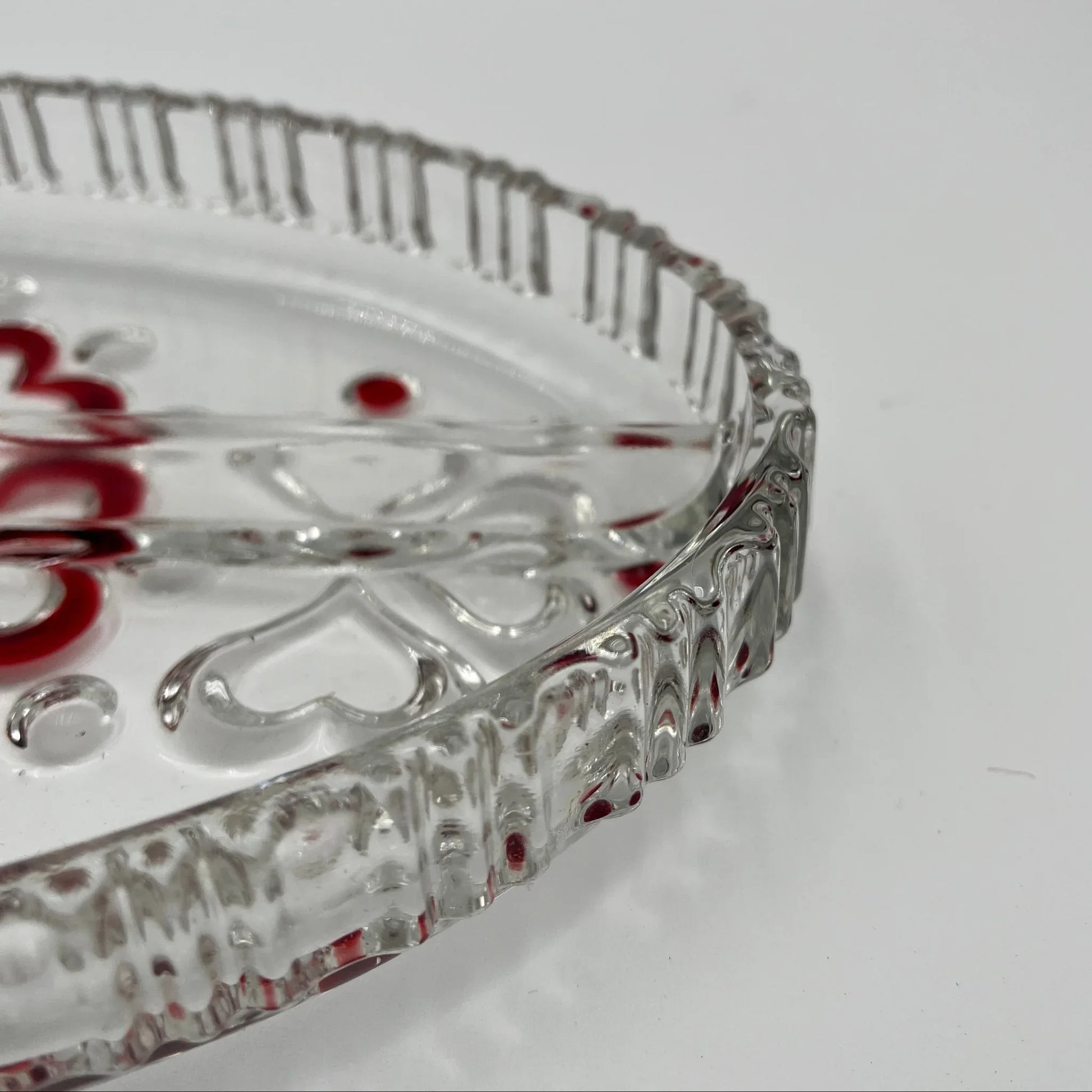 This is a vintage Walther Glas "Sweetheart" serving bowl, designed as a snack or sweets dish with a red heart and dot pattern. It is an oval, clear glass divided serving dish with a crimped edge.

